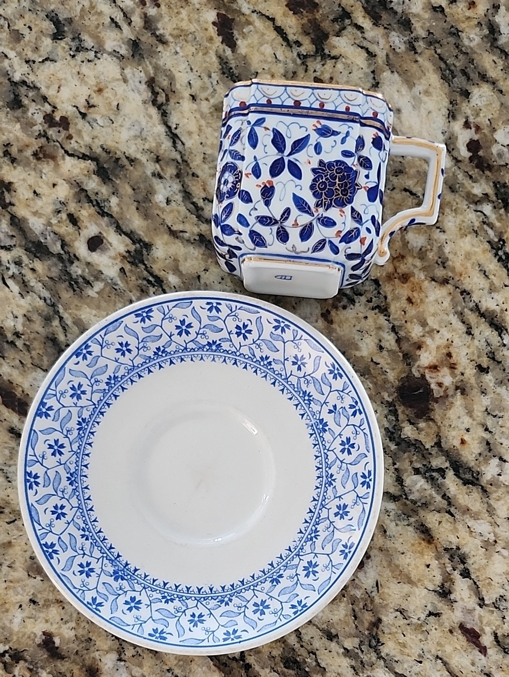 Antique White and Blue Floral Porcelain Mug and Saucer Set